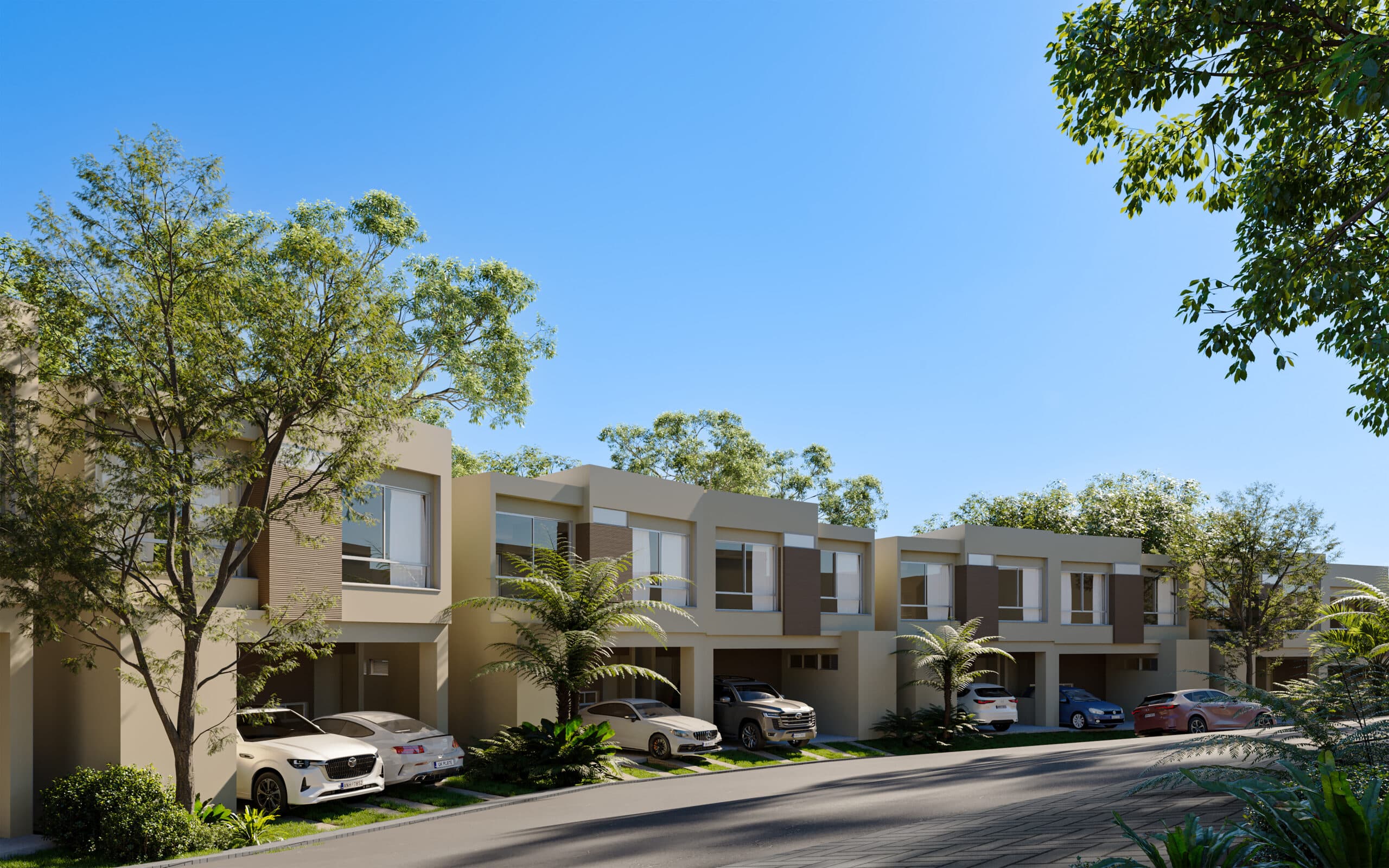 Cartagena Townhouses: Modern beige townhouses with lush greenery near the coast